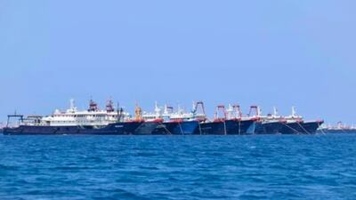 Chinese vessels are seen moored at Whitsun Reef in South China Sea. The Philippines government said there were more than 200 Chinese vessels at the reef. Philippine Coast Guard / National Task Force-West Philippine Sea via AP