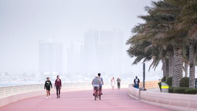 A hazy day in Dubai. The UAE will experience dusty and partly cloudy conditions on Saturday. Reem Mohammed / The National