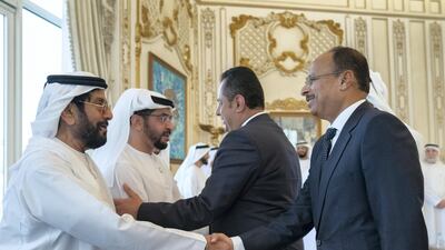 Sheikh Hamdan bin Zayed greets Dr Abdulmalik during a Sea Palace barza. Seen with Sheikh Tahnoon bin Mohamed.