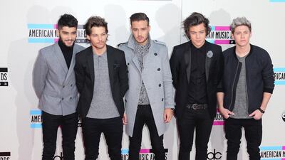One Direction band members Zayn Malik, Louis Tomlinson, Liam Payne, Harry Styles and Niall Horan will play Dubai in April 2015. David Livingston / Getty Images