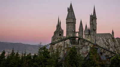 Hogwarts castle, with a view of Flight of the Hippogriff, Universal Studios Hollywood’s first outdoor roller coaster. Photo: Universal Studios