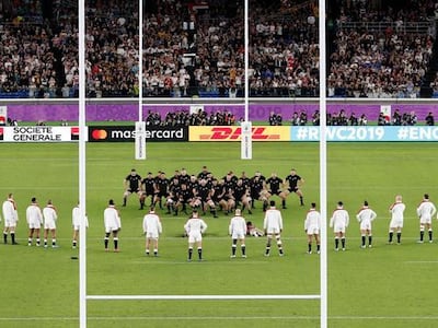 England players lined up in a V formation as the All Blacks performed their haka during the Rugby World Cup semi-final at International Yokohama Stadium, an act that earned them a fine. Associated Press