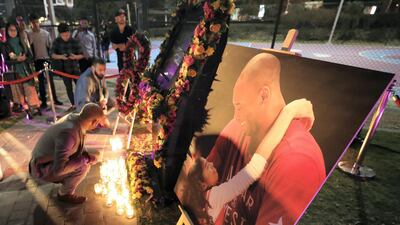A tribute to remember the life of basketball legend Kobe Bryant and to light a candle in his memory at JLT basketball court - a place he inaugurated to inspire and share his love of the game. Chris Whiteoak / The National
