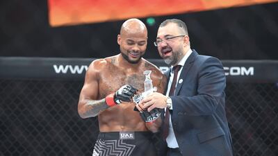 Fouad Darwish, managing director of Palms Sports, presents an award to Seb Eubank. Khushnum Bhandari for The National