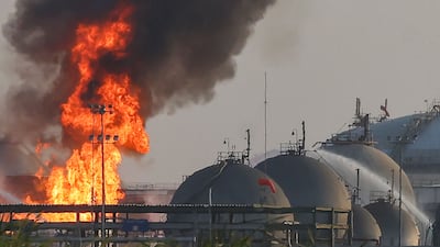 Flames burn at a site belonging to Saudi oil giant Aramco south of Riyadh on Saturday. AFP