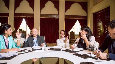 Dominique Ropion (second from left) showcasing his created fragrance. Courtesy: IFF