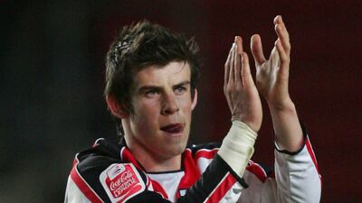 Gareth Bale of Southampton applauds the fans after the Championship match against Colchester United at St Mary's Stadium in March 2007. Getty