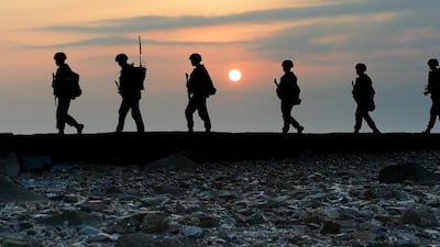 South Korean marines patrol the shore of Yeonpyeong island, just south of the Northern Limit Line. Min Gyeong-seok / Reuters