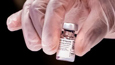 A medical worker prepares a Covid-19 vaccine as US President Joe Biden visits a Veterans Affairs Covid-19 vaccination center in Washington, DC, USA. EPA