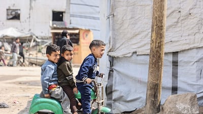 Palestinian children play on a street in Gaza city. Sources say the Palestinian committee appointed to govern the strip has made little progress. AFP
