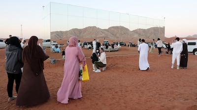 Visitors can interact with and take pictures of the mirrored kitchen.