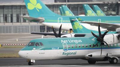 Aer Lingus planes at an airport.AP