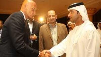 Sheikh Hazza bin Zayed, the chairman of the Abu Dhabi Sports Council and Al Ain Sports Club, greets the Italian referee Pierluigi Collina.