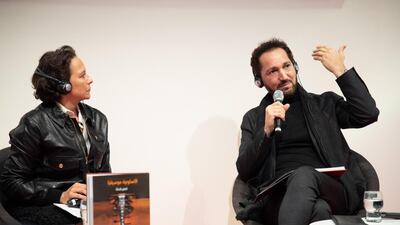 Iraqi oud musician Naseer Shamma (right) discusses his book with German singer Michele Adamski at the Frankfurt Book Fair on October 16, 2019. Courtesy Kalima