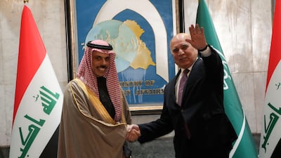 Saudi Minister of Foreign Affairs Prince Faisal Bin Farhan is received in Baghdad by Iraqi Foreign Minister Fuad Hussein. AP
