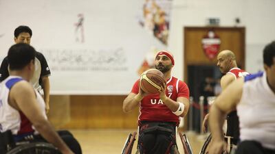 The UAE's men's wheelchair basketball team in action against Jordan at Al Ahli Sports Club in Dubai. Lee Hoagland / The National