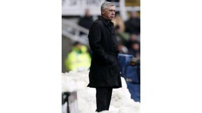 Carlo Ancelotti watches yesterday’s game at St James’ Park from a snowy vantage point on the sidelines.