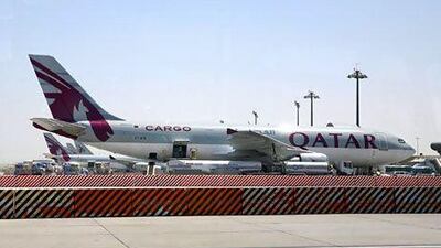 A Qatar Airways cargo plane at the Doha International Airport. Qatar has outlined its ambitious vision for growth. Randi Sokoloff / The National