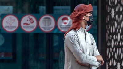 The National's photographers are out and about on the streets of the UAE. Here, a man waits for a bus in Abu Dhabi. Victor Besa / The National