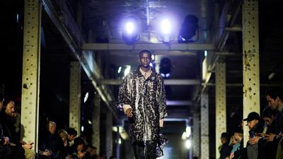 For Autumn/Winter 2020, Qasimi turns tortoiseshell into loose raincoats at London Fashion Week Men's. Reuters