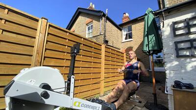 Sbihi using a rowing machine in his back garden to train this year.