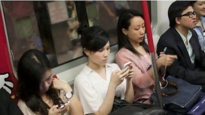 The use of smartphones is on the rise in China with 42 million being sold in the second quarter of this year. Jerome Favre / EPA