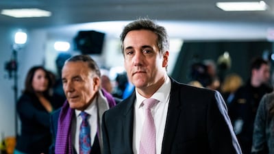 Michael Cohen departs after testifying privately before the Senate Intelligence Committee. EPA
