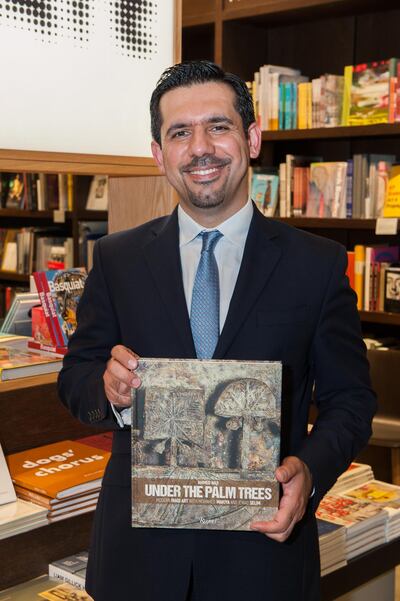 Author Ahmed Naji with a copy of his book at a talk at Tate Modern earlier this year.