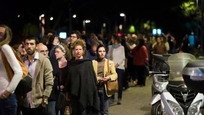 Hundreds of Israelis lined up outside a Tel Aviv auditorium to attend a controversial Memorial Day ceremony that also honoured the lives of Palestinians.