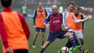 New Fifa president Gianni Infantino (C) plays the ball during a Fifa Team Friendly Football Match at the Fifa headquarters on February 29, 2016 in Zurich, Switzerland. (Photo by Philipp Schmidli/Getty Images)