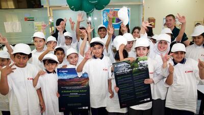 Al Bashair Private School pupils with the certificate for the UAE Schools Environmental Sustainability Competition. Courtesy Canon