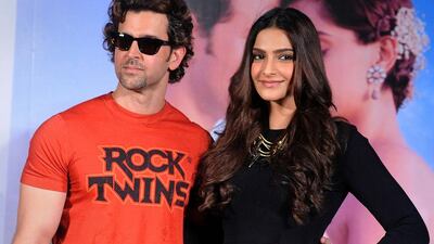 Bollywood actors Hrithik Roshan, left, and Sonam Kapoor during the launch of their T-Series music video Dheere Dheere. AFP photo