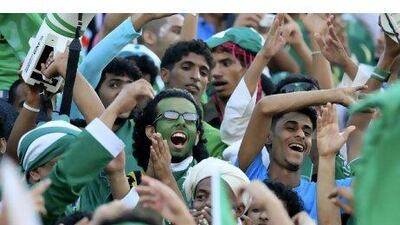 Saudi Arabian fans attend the Gulf Cup soccer tournament final in Aden on Sunday.
