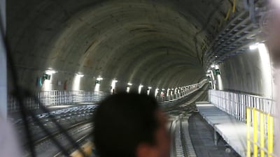 A worker stands in a train during an event inaugurating the new station on the new Metro Line 4 subway that links the Ipanema and Barra da Tijuca neighbourhoods. Mario Tama / Getty Images