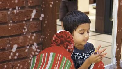 Rayyan Farrukh, 4, enjoys himself at the World Trade Centre Mall in Abu Dhabi. Delores Johnson / The National