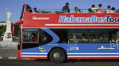 A double-decker bus waits for tourists to board in Old Havana. Enrique De La Osa / Reuters