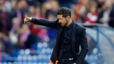 Atletico Madrid manager Diego Simeone gestures during their Champions League win over FC Astana on Wednesday night. Daniel Ochoa de Olza / AP / October 21, 2015