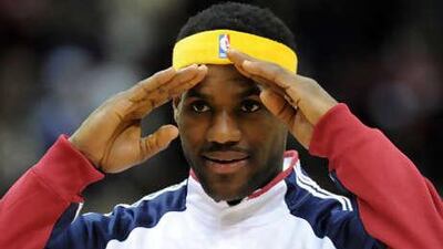 Cleveland Cavaliers LeBron James gives the double salute prior to the Cavaliers NBA basketball game against the Los Angeles Lakers in Cleveland on January 21, 2010.