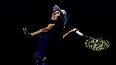 Daria Gavrilova of Australia prepares to hit an overhead shot to Eugenie Bouchard of Canada in the women's singles match on Day Two of the Hopman Cup 2018 at Perth Arena in Perth, Australia. Will Russell / Getty Images