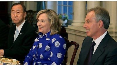 Hillary Clinton, the US secretry of state, sits with the UN secretary general, Ban Ki-Moon, and Quartet representative Tony Blair, at the Department of State in Washington yesterday. Mark Wilson / Getty Images / AFP