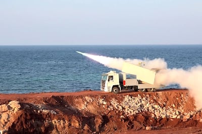 Iran's Islamic Revolutionary Guard Corps fires a missile during military exercises near the Strait of Hormuz. AFP
