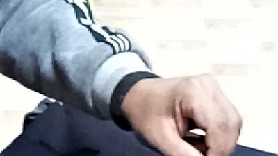 In Rogan painting, a needle is dabbed into ink and then rolled and dragged to form geometric or floral patterns.