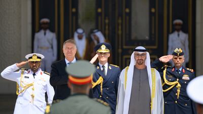 The President and Mr Iohannis at Qasr Al Watan. The leaders discussed potential opportunities to expand collaboration in trade, sustainability, food security, renewable energy and the economy. Abdulla Al Neyadi / UAE Presidential Court