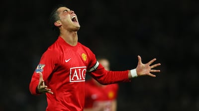 Manchester United's Cristiano Ronaldo celebrates after scoring the goal against Bolton - on March 19, 2008 - that took him past George Best's record tally of 32 in a season. Getty