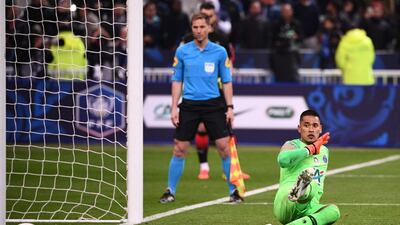 PSG keeper Alphonse Areola fails to catch a ball kicked by Rennes forward Mbaye Niang during the penalty shootout. Martin Bureau / AFP