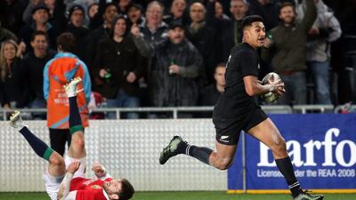 Rieko Ioane sprints away to score his second try for New Zealand in the first Test against the British & Irish Lions at Eden Park on Saturday. Michael Bradley / AFP