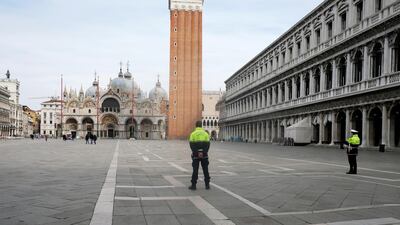 The almost empty St. Mark's Square is seen after the Italian government an extension of the shutdown in Italy including Venice to try to contain a coronavirus outbreak, in Venice, Italy. Reuters