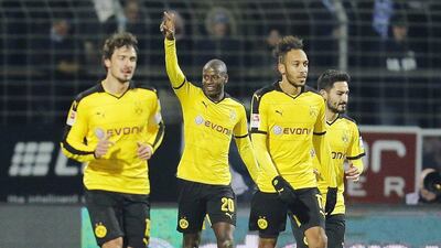 Borussia Dortmund's Adrian Ramos, centre, celebrates his side's opening goal against Darmstadt in the Bundesliga on Wednesday night. Michael Probst / AP / March 2, 2016