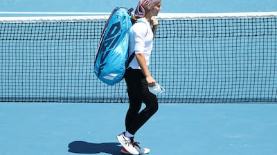 Meshkatolzahra Safi walks onto court ahead of her match against Anja Nayar. Getty Images