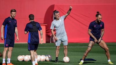 Sevilla manager Jose Luis Mendilibar oversees training. AFP